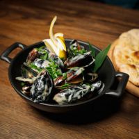 Мидии в вине и сыре