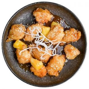 Курка в кисло-солодкому соусі з ананасом