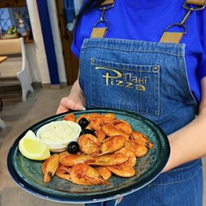 Креветки у томатному соусі