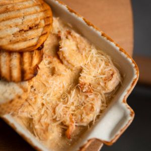 Креветки в вершково - сирному соусі