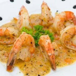 Хвости креветок у вершковому соусі